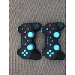 Zwarte PlayStation 3 met games en 2 controllers