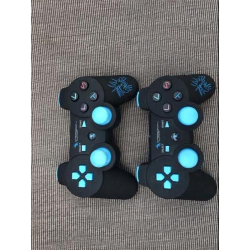 Zwarte PlayStation 3 met games en 2 controllers