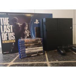 Playstation 4 500GB met 8 games en aankoopnota met doos