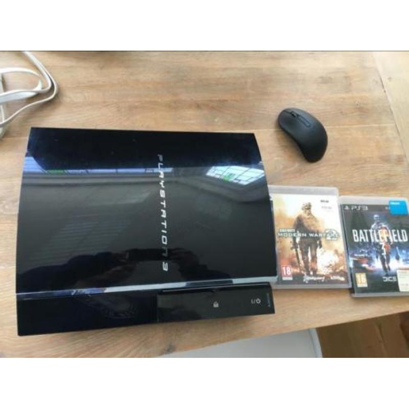 Playstation 3 in goede staat,kabels, controller, 2spellen